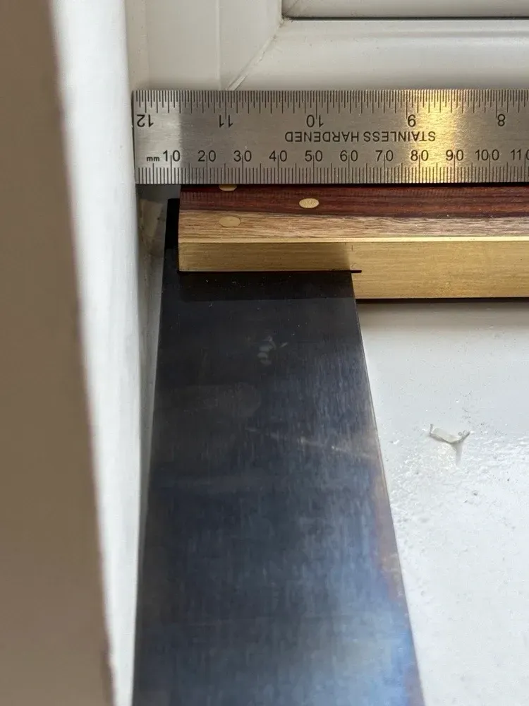 Measuring a finishing detail in a newly built home